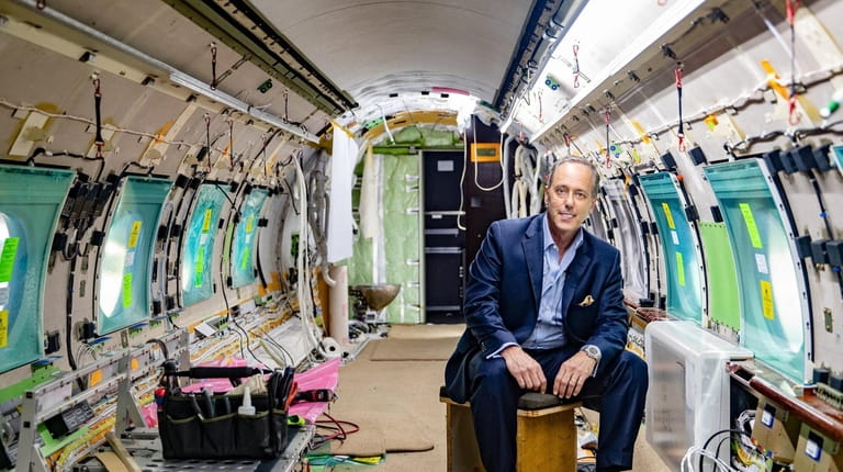 International Jet Interiors President Eric H. Roth inside a jet undergoing...