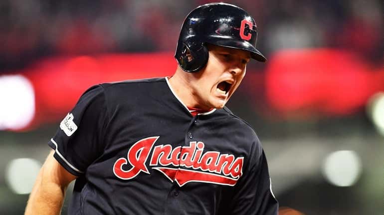 Jay Bruce of the Indians runs the bases after hitting...