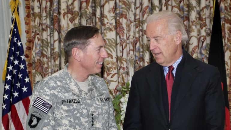 Vice President Joe Biden, right, speaks with Gen. David Petraeus...