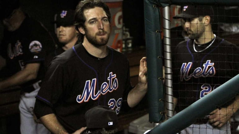 New York Mets' Ike Davis (29) reacts as they lose...