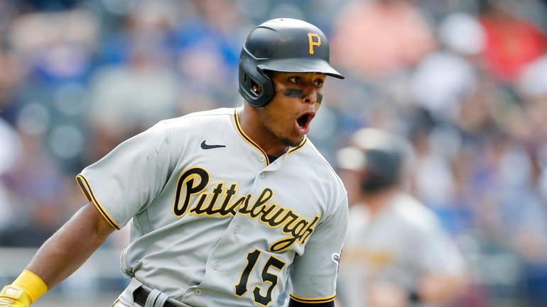 Wilmer Difo #15 of the Pittsburgh Pirates reacts after his...
