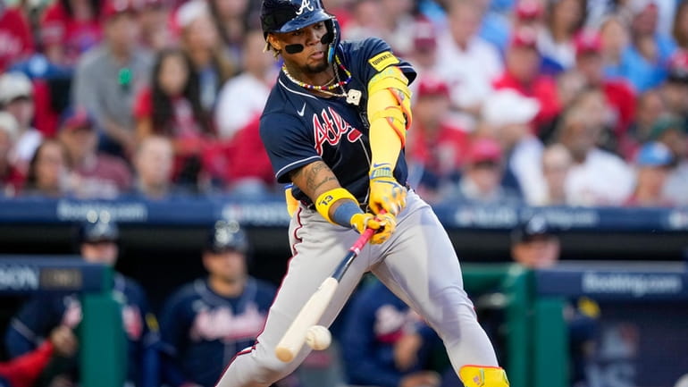 Atlanta Braves' Ronald Acuna Jr. hits a double during the...