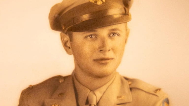 Air Corps Lt. George E. Braet poses in his uniform.