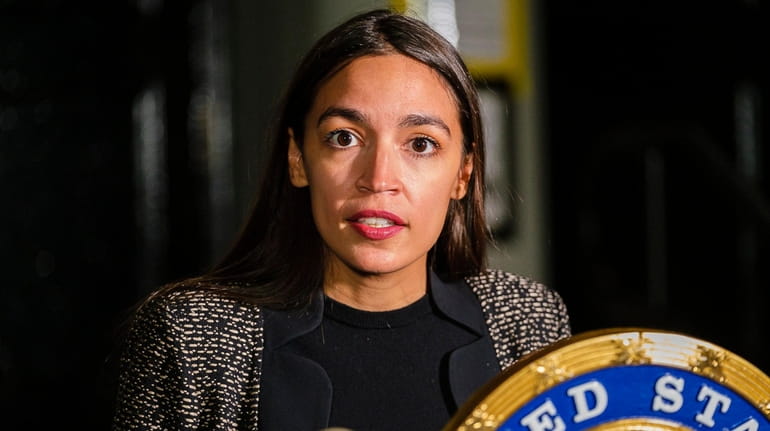 Rep. Alexandria Ocasio-Cortez speaks at a news conference outside James...
