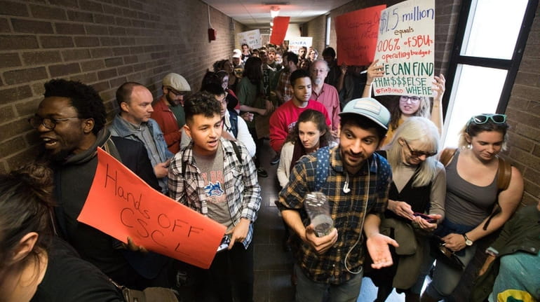 Stony Brook University students protested against proposed budget cuts affecting...