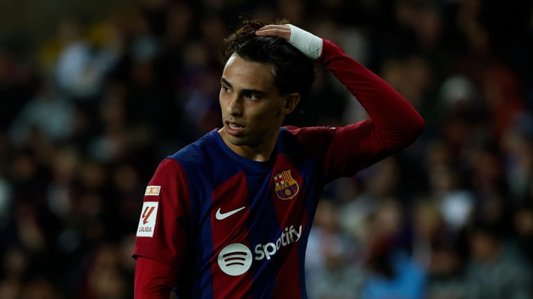Barcelona's Joao Felix reacts after a missed scoring opportunity during...