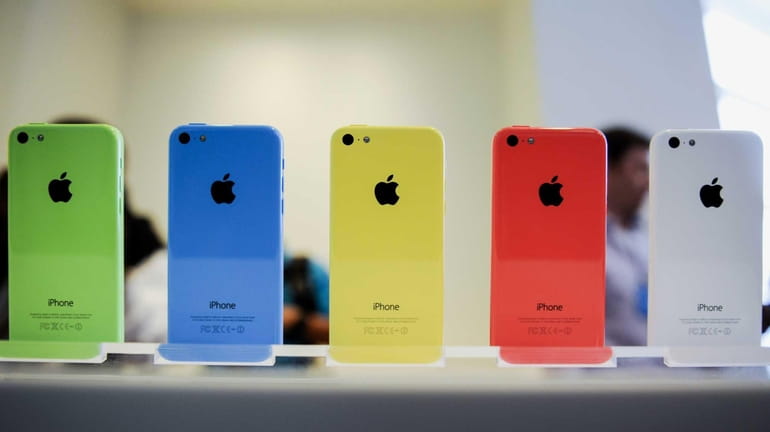 Several colors of Apple's iPhone 5C during their introduction on...