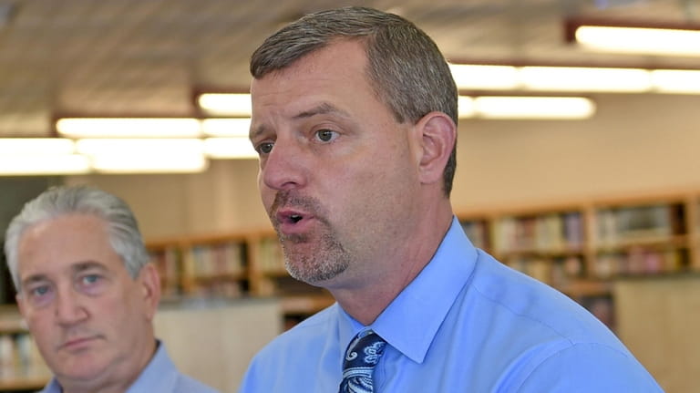 Kevin Coster (right), the district’s superintendent, noted that William Floyd...