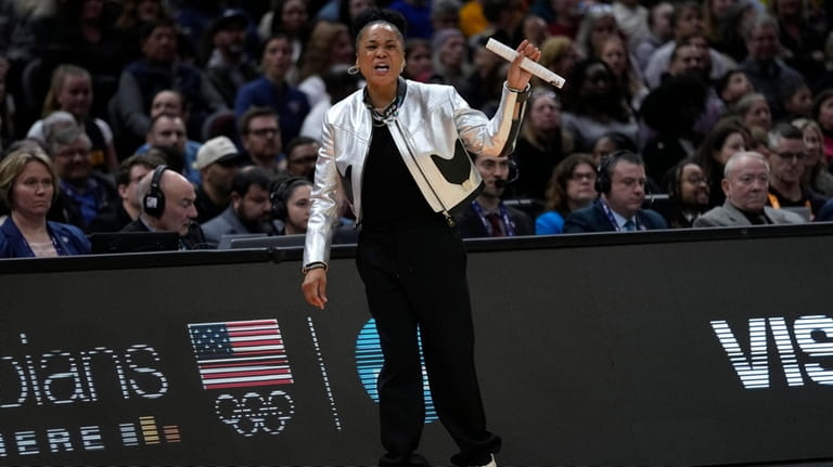 South Carolina head coach Dawn Staley reacts to a call...