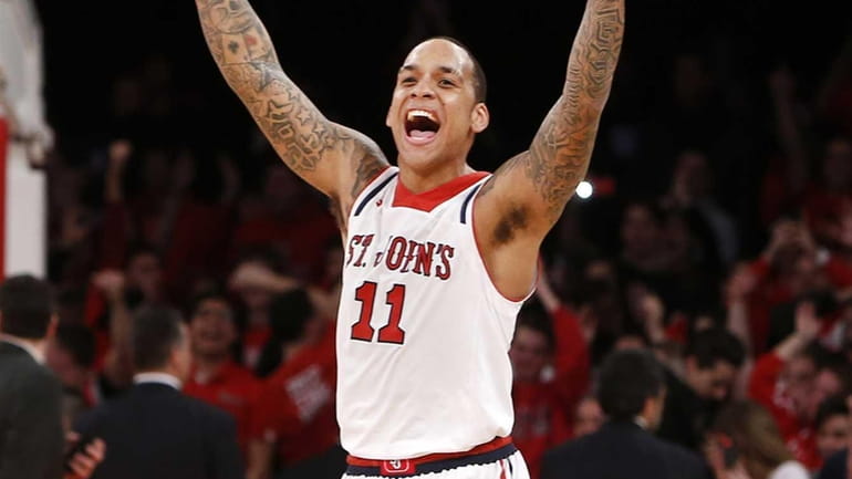 St. John's D'Angelo Harrison (11) celebrates after beating Creighton on...