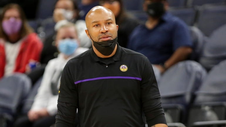 FILE -Los Angeles Sparks coach Derek Fisher watches the team...