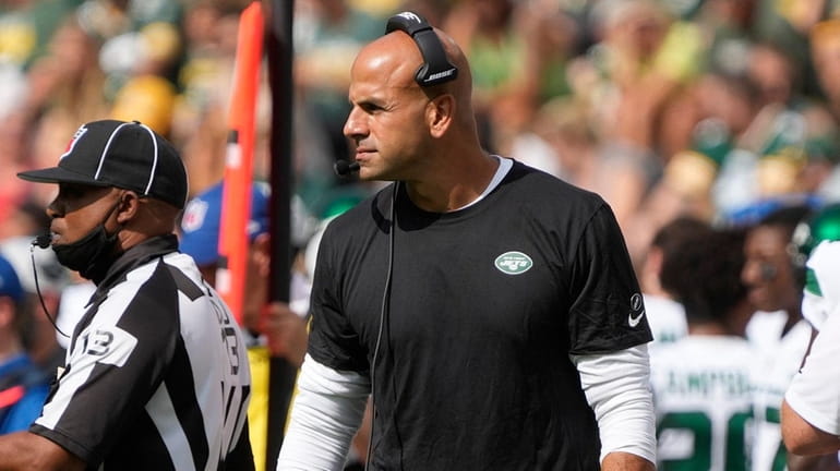 Jets head coach Robert Saleh watches during the first half...