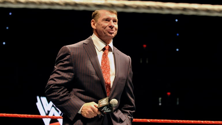 WWE chairman and CEO Vince McMahon speaks to an audience...