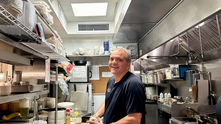 Co-owner Tommy Pagonis in the kitchen at Louie's in Manhasset.