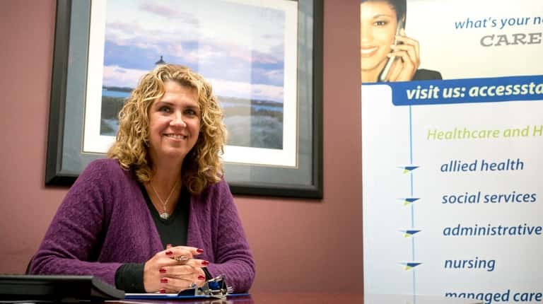 Linda Langer, vice president at Access Staffing, poses for a...