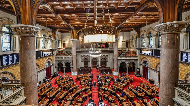 The New York state Assembly Chamber as members meet at the...
