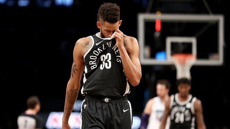 Allen Crabbe of the Nets reacts late in the fourth...