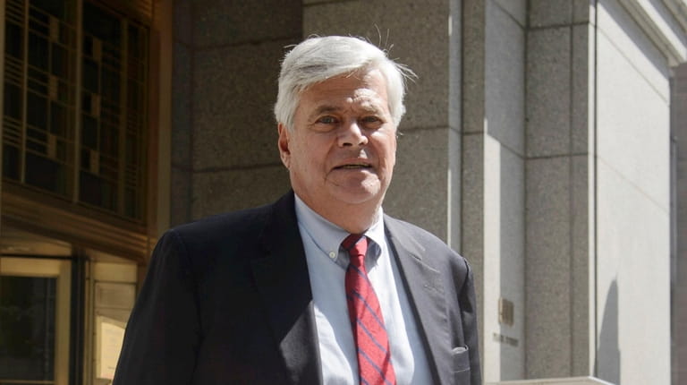 Dean Skelos exits the federal courthouse in Manhattan during his...