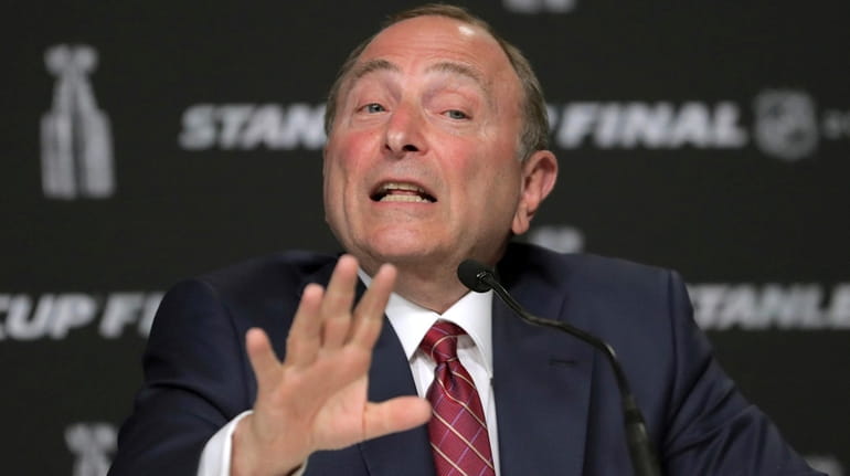 In this May 27, 2019, file photo, NHL Commissioner Gary...