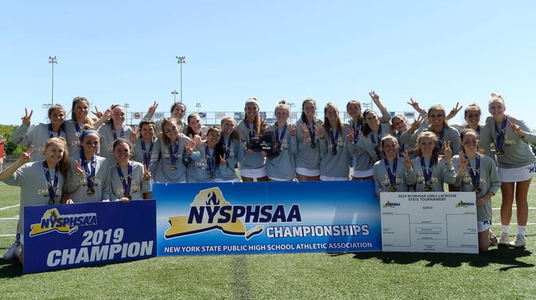Mattituck/Southold players pose for photos after the Class D final...