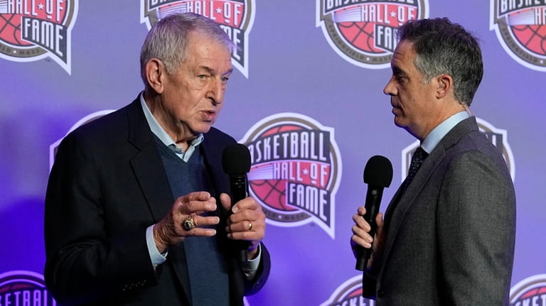 Jerry Colangelo, left, chairman of the Naismith Memorial Basketball Hall...