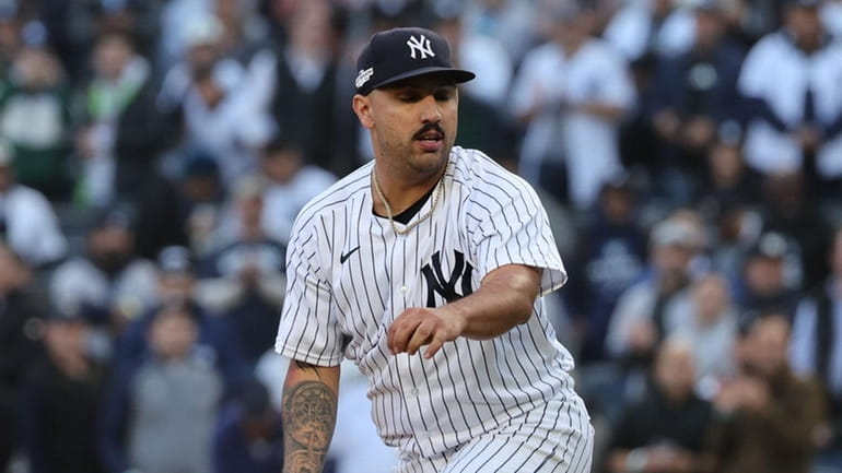 Yankees starting pitcher Nestor Cortes (65) reacts after he strikeout...