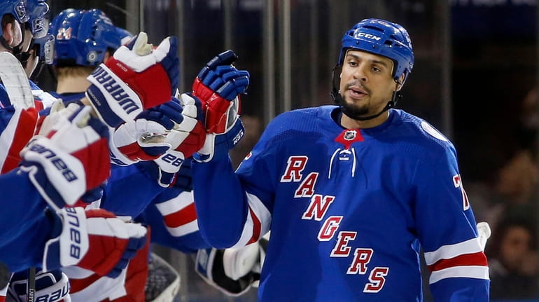 Ryan Reaves #75 of the Rangers celebrates his second period goal...