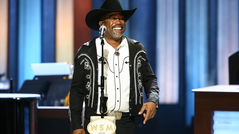  Darius Rucker performs on stage during the Grand Ole Opry's...