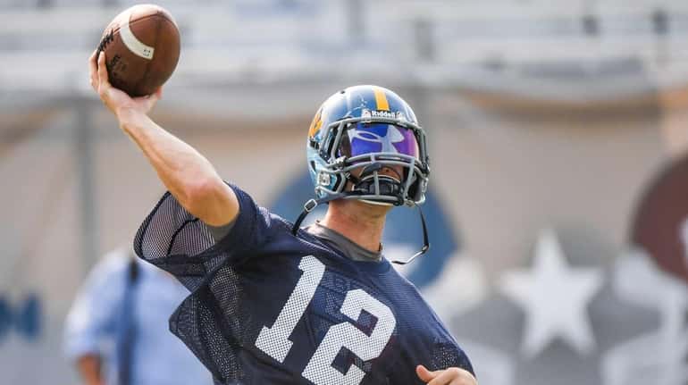 Quarterback Michael Catanese school from Carey High School playing for...