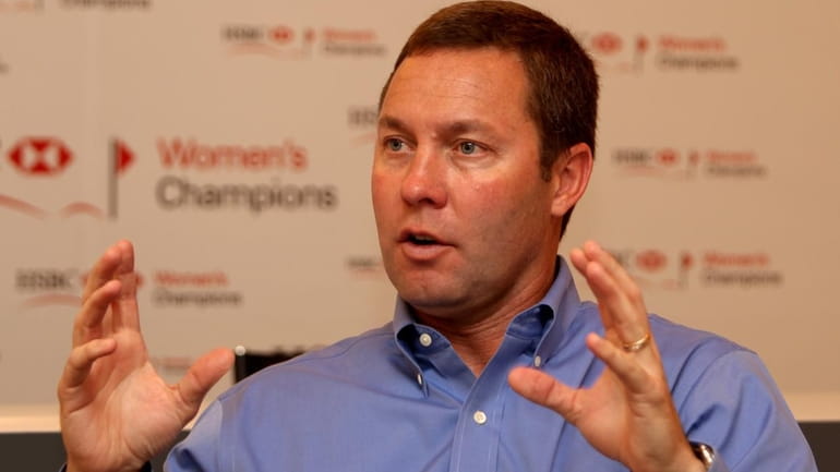 Mike Whan the LPGA Commissioner gives a press conference during...