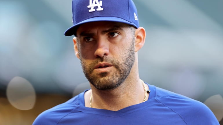 J.D. Martinez #28 of the Los Angeles Dodgers looks on...