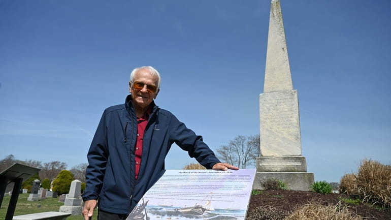 Lynbrook Village Historian Art Mattson at the Rockville Cemetery monument commemorating victims...