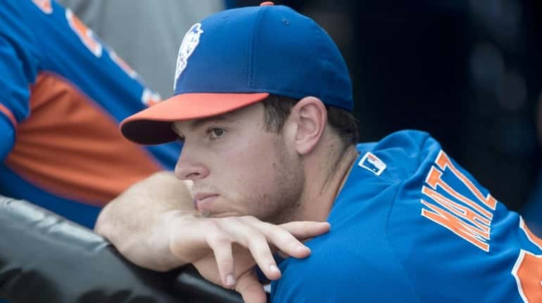 New York Mets pitcher Steven Matz looks on during spring...