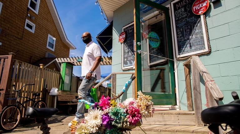 Michael Chambers of Queens leaves Matthew's Seafood.