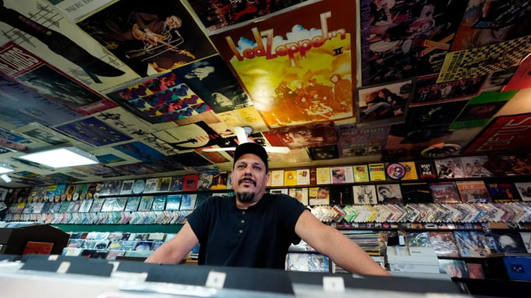 Tim Stamper, owner at Tracks In Wax record shop, pauses...