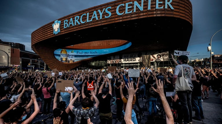 Protesters gather at Barclays Center in Brooklyn on Wednesday night during...