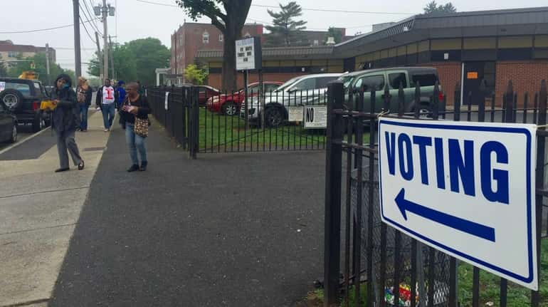 People turn out to vote on Tuesday, May 19, 2015,...