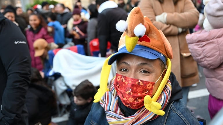 Paradegoers at the annual Macy’s Thanksgiving Day Parade ushering in the...