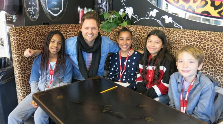 Singer Nick Howard with Kidsday reporters, from left,  Samantha Silie,...
