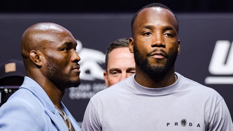Kamaru Usman, left, looks to recapture his welterweight title from...