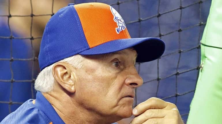 New York Mets manager Terry Collins watches batting practice before...