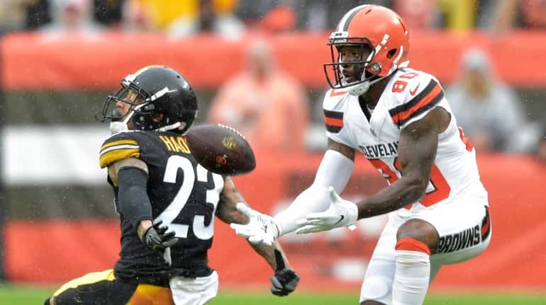 The Browns Jarvis Landry catches a pass for a first down in...