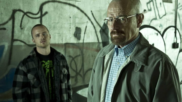 From left, Jesse Pinkman (Aaron Paul) and Walter White (Bryan...