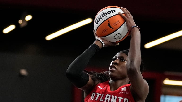 Atlanta Dream guard Rhyne Howard (10) shoots during a WNBA...
