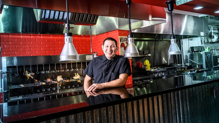 Co-owner and chef Israel Zavala at Holy Smoke Grill in...