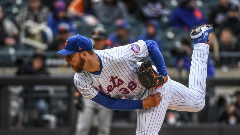 New York Mets Tyler Megill throws in the first inning...