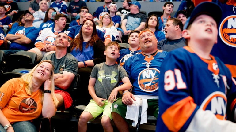 Fans watch intently as the Islanders announce their first pick...