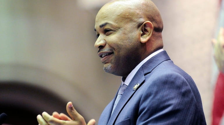 Assembly Speaker Carl Heastie, D-Bronx, applauds in the Assembly Chamber...