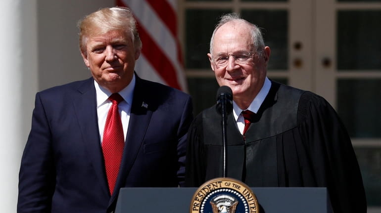 President Donald Trump, left, and Supreme Court Justice Anthony Kennedy...