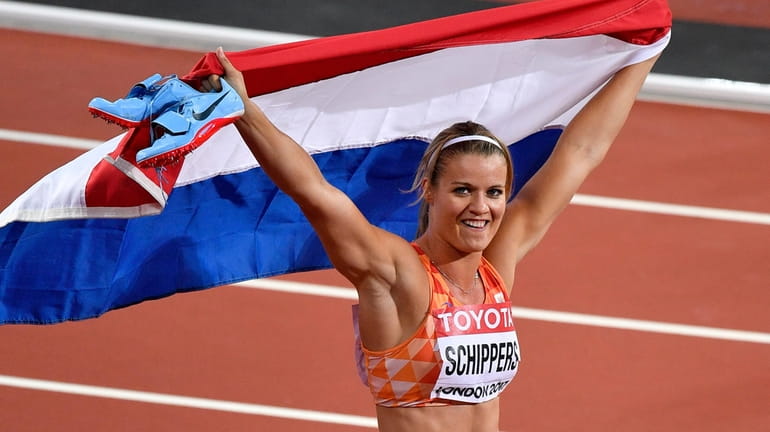Netherlands' Dafne Schippers celebrates after winning the Women's 200 meters...